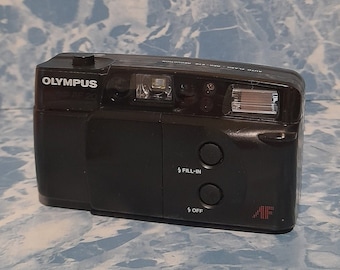 Working film camera. Camera Olympus Trip AF 20. film camera. Olympus film camera from the 1990s. Collection camera. Olympus camera.