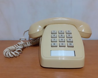 Vintage telephone. Old telephone. 1985's telephone. Phone from Australia. Landline phone. Push-button stationary telephone.