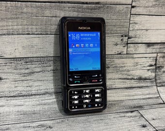 Teléfono móvil Nokia 3250 de época, en perfecto estado de funcionamiento, con cargador, probado y original.