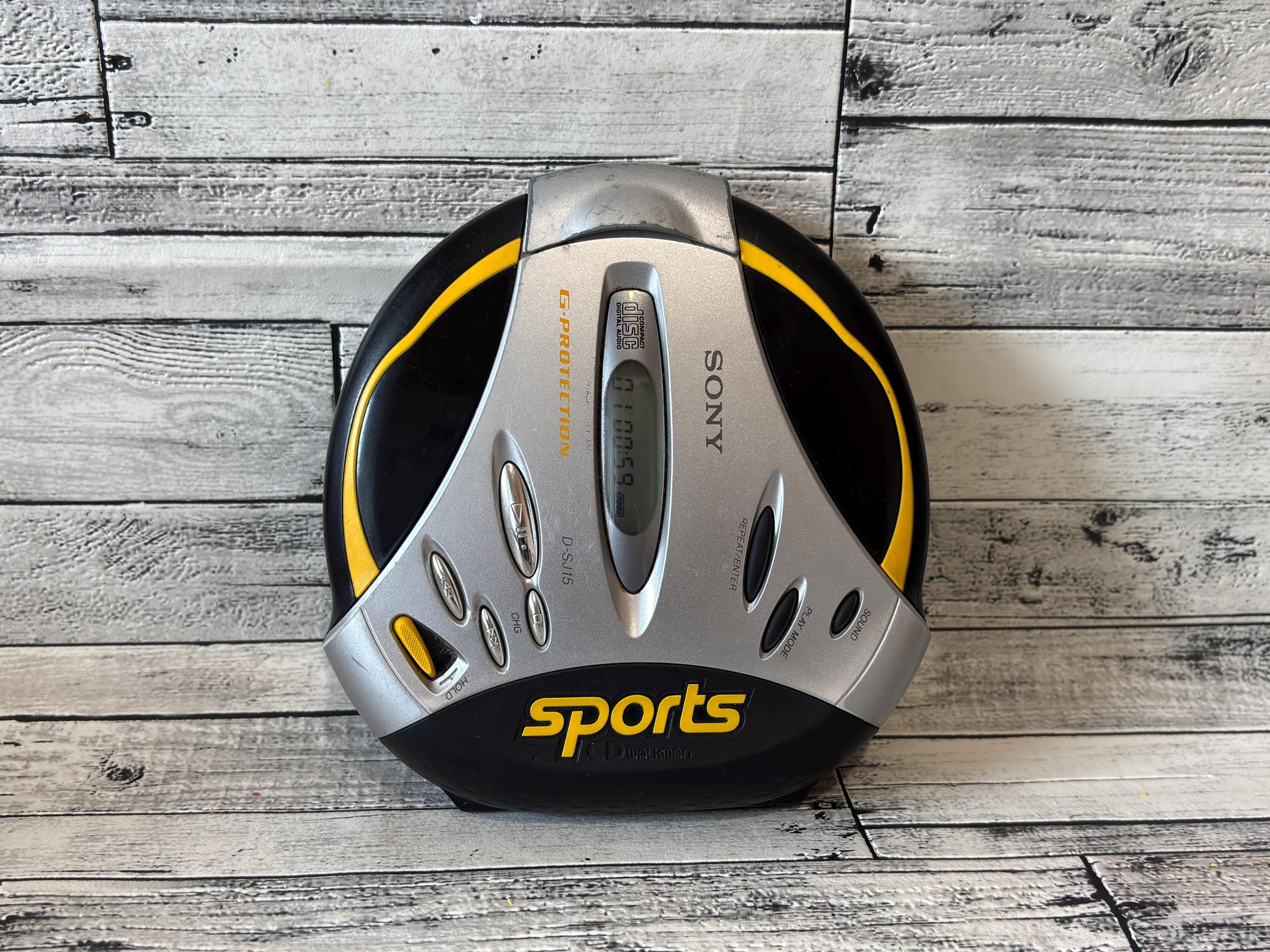【動作品】SONYSPORTS D-SJ15 CDウォークマン アダプター付 Vintage Sony D-SJ15 CD Player: Yellow Sports Discman G-protection
