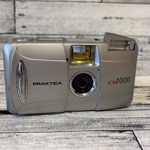 Cámara de película Praktica CM1000 vintage: probada y funcionando, flash incorporado