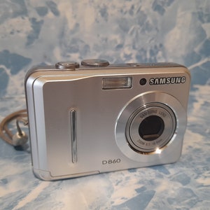 Not a Working digital camera. Camera Samsung D860. Digital camera. Samsung digital camera from the 2000s. Collection camera. Samsung camera.