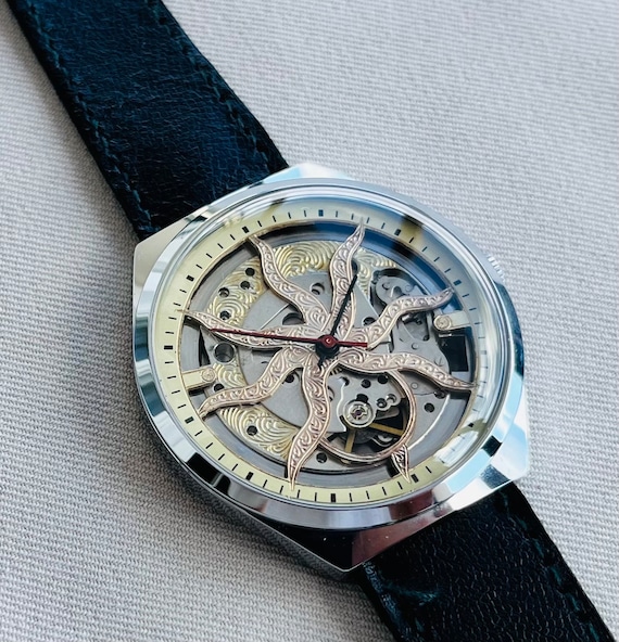 Rare Vintage Raketa star Sun wrist watch, skeleton