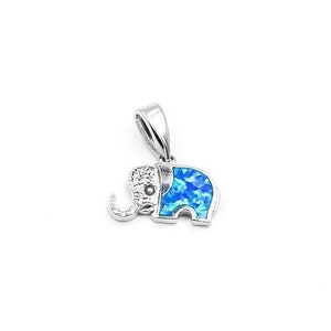 May include: A silver charm pendant in the shape of an elephant with blue opal inlay.