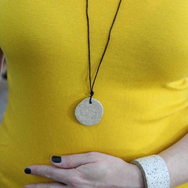 Stoneware Disk Necklace | Handmade Speckled Ceramic Unglazed | Black Bamboo Cord | Bold Statement | Adjustable Length | Mid-Century Inspired