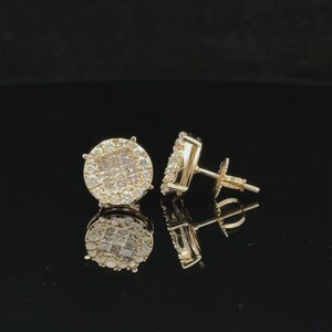 Add brilliant sparkle to your jewelry collection with these elegant 14K yellow gold lab grown diamond earrings. The round design features a sparkling center of carefully arranged lab-grown diamonds surrounded by a pavé diamond halo, creating a beautiful layered look with exceptional brilliance.