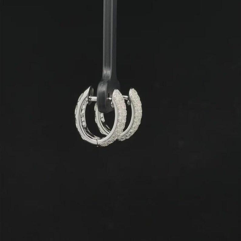 Add timeless sparkle to your jewelry collection with these elegant 14K white gold lab grown diamond hoop earrings. Designed with multiple rows of brilliant lab-grown diamonds, these hoops create a luxurious pavé look with exceptional shine from every angle.