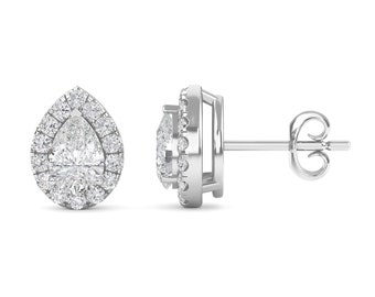 May include: A pair of silver pear-shaped earrings with a halo of smaller diamonds around the center stone.