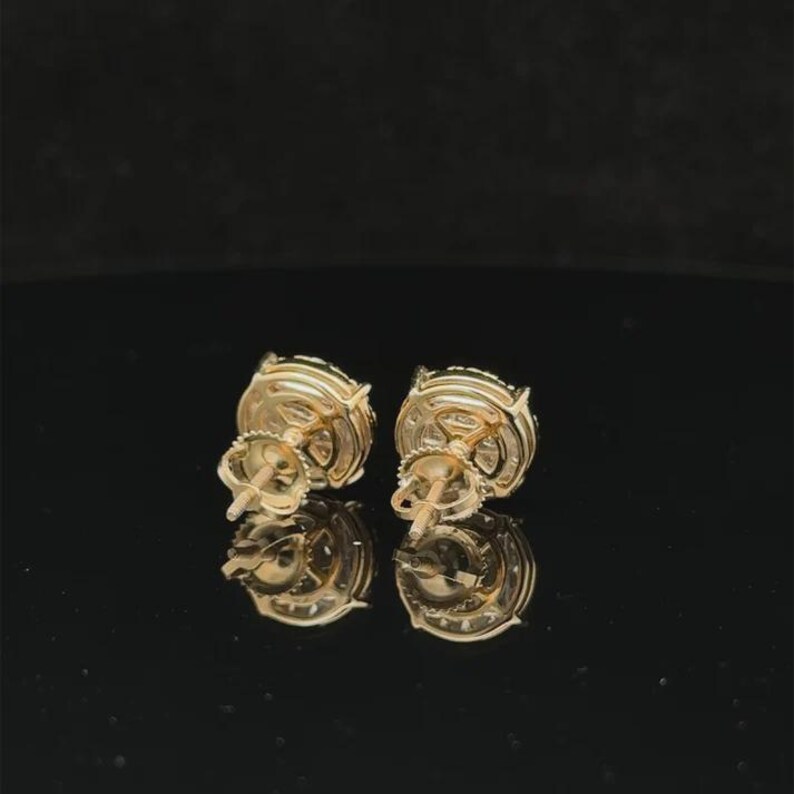 Add brilliant sparkle to your jewelry collection with these elegant 14K yellow gold lab grown diamond earrings. The round design features a sparkling center of carefully arranged lab-grown diamonds surrounded by a pavé diamond halo, creating a beautiful layered look with exceptional brilliance.