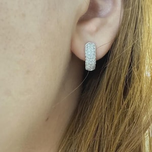 Add timeless sparkle to your jewelry collection with these elegant 14K white gold lab grown diamond hoop earrings. Designed with multiple rows of brilliant lab-grown diamonds, these hoops create a luxurious pavé look with exceptional shine from every angle.