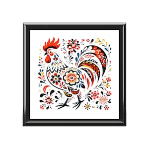May include: A framed print of a rooster with a colorful, floral design. The rooster is red, orange, yellow, blue, and green. The background is white.