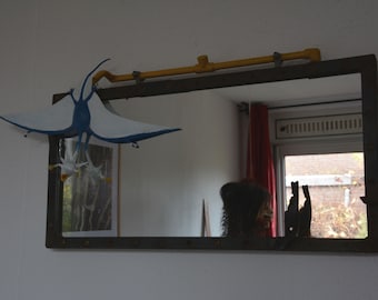 Mirror with flying cow