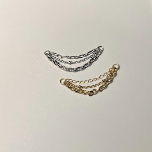 mixed style chain, triple chain, ear chain, nose chain, helix chain, conch chain, ear curation, curated piercings, earring chain, lobe chain