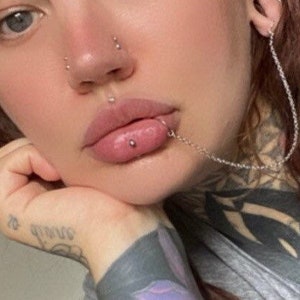 Fake lip to store ear chain