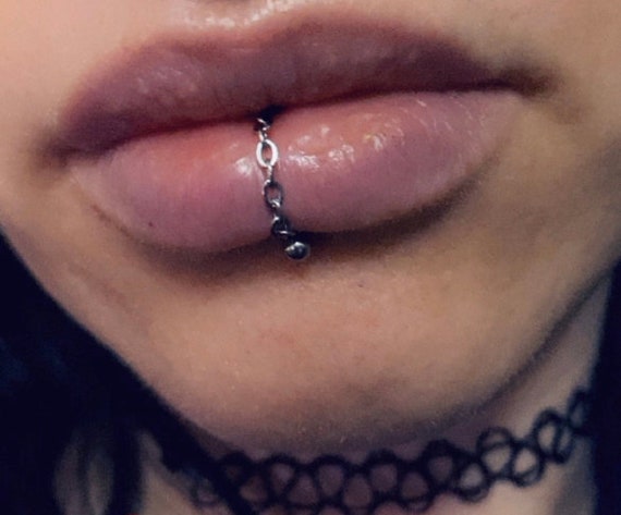 Dangling Studded Cross Lip RingPierced 14G | Lip piercing ring, Fake lip  ring, Fake lips