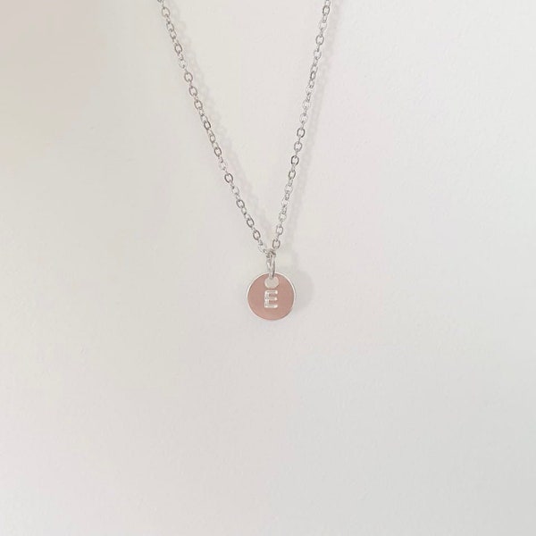 Letter E initial coin necklace in colour silver