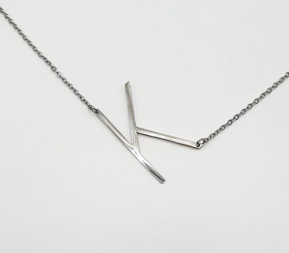 Slanted letter necklace shop