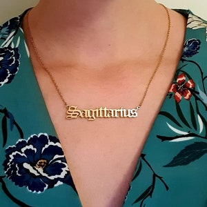 Sagittarius zodiac star sign necklace Stainless steel in colour gold image 1