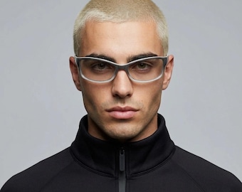 Y2K vintage futuristic sunglasses. Gloss white and grey wrap around shield style frame with light tone lenses. Cosplay visor. 2000s NOS