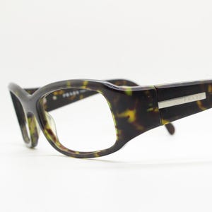 Prada rectangular wrap around eyeglasses made in Italy. Tortoise curving acetate optical frame with tall arms. Vintage prescription glasses