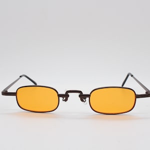 90s vintage small rectangular sunglasses. Imposing minimal bronze brown metal victorian style frame with orange lenses. Steampunk. BNWT