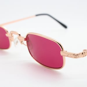 90s vintage small rectangular sunglasses. Imposing minimal gold metal victorian design frame with shocking pink lenses. Unused BNWT