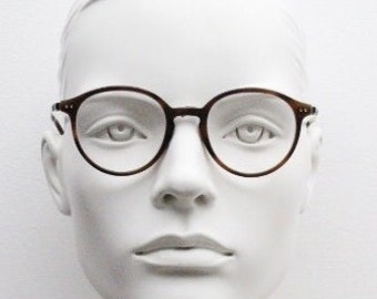 Giorgio Armani eye glasses model 7124 made in Italy. Mottled brown acetate optical frames with flat metal arms. Prescription eyeglasses. RX