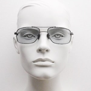 90s vintage modified rectangular aviator sunglasses. Gunmetal chrome frame aviators with light tone smoky grey lenses. Unused NOS