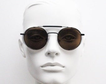 90s vintage round goggle sunglasses. All metal grey chrome frame with folding blinkers and brown lenses. Spoilers. Steampunk. NOS