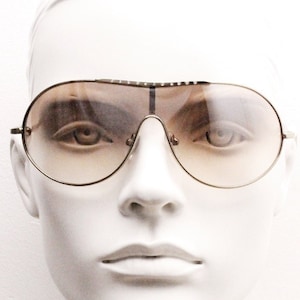 Y2K vintage visor aviator sunglasses. 2000&#39;s brown wraparound mono lens mini mask shield design with slim gunmetal arms. BNWT. 00&#39;s NOS