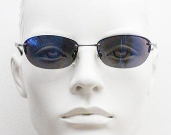 90s vintage small bug eye oval sunglasses. Minimal silver satin finish solid metal half frame with blue mirror lenses. Y2K.  NOS sample