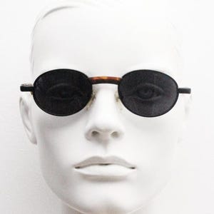 90s oval vintage metal sunglasses. Classic 1990s features of minimal satin finish solid frame with matt tortoise arms. Steampunk. Unused NOS