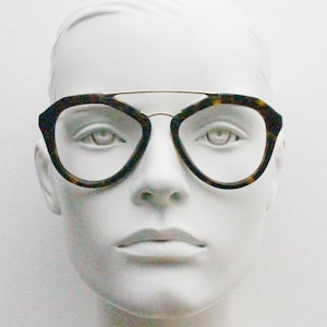 Prada angular eye glasses made in Italy. Thick tortoise acetate optical frames with prominent gold double bridge. Prescription. RX
