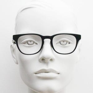 Andi Black rectangular horn rim eye glasses. Black gloss 40s design acetate optical frames with keyhole bridge. Prescription RX spectacles