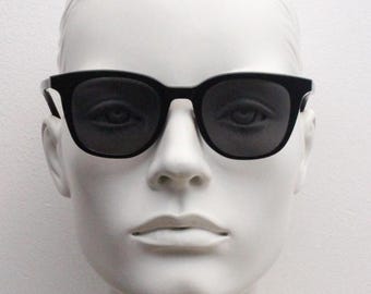 Vintage 90s slim frame black horn rim sunglasses. All time classic retro refined wayfarer design in gloss with black lenses