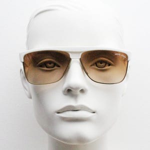 Pierre Leman Paris 80s vintage rectangular sunglasses made in France. Ice white flat top half frame with brown graduating lenses
