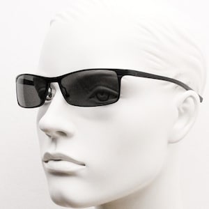 90s vintage sharp rectangular sunglasses by Storm. Minimal matt finish low profile flat top with straightened arms. 60s design. NOS