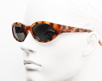 Vintage 90s oval chic cat eye sunglasses. Womens vibrant tortoise quality acetate frame with green lenses. 60s design. VGC NOS