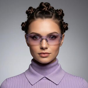 Y2K vintage visor sunglasses. Frameless 2000's purple wraparound mini mask shield design with light tone mono lens and flower print. 00s NOS