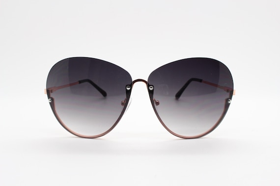 Y2K Vintage Large Rimless Sunglasses. Women display picture 3