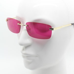 Y2K vintage frameless pink sunglasses. Rectangular lenses with gold bridge and arms. 2000s club kids. 00&#39;s. 90s Rave