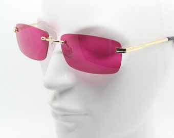 Y2K vintage frameless pink sunglasses. Rectangular lenses with gold bridge and arms. 2000s club kids. 00's. 90s Rave