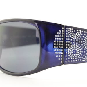 Assoluto 90s vintage wrap around rhinestone shield sunglasses made in Italy. Deep blue acetate frame with dazzling diamante circles. NOS