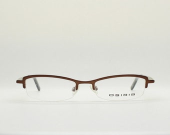 Osiris 90s vintage rectangular half rim eye glasses. Low profile optical frame in handsome brown chrome. Prescription RX Spectacles