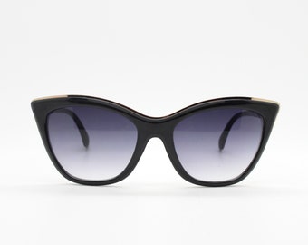 Gafas de sol estilo ojo de gato vintage Y2K. Montura negra audaz con lentes graduadas sensuales. Gafas de sol estilo rockabilly pin-up de los años 50 para mujer.