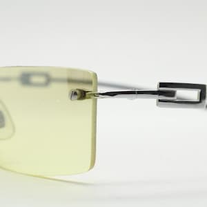 Y2K vintage rectangular sunglasses. Minimal frameless light tone curved mirrored lenses with silver chrome trim. 2000&#39;s. 90s. 00s. NOS