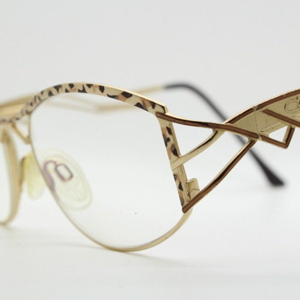 Cazal 90s vintage eye glasses. Mesmerising metallic animal print optical frames with innovative arm design. Prescription eyeglasses. RX