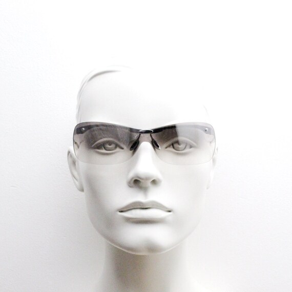 Y2K vintage visor sunglasses. Charismatic frameless 2… Gem
