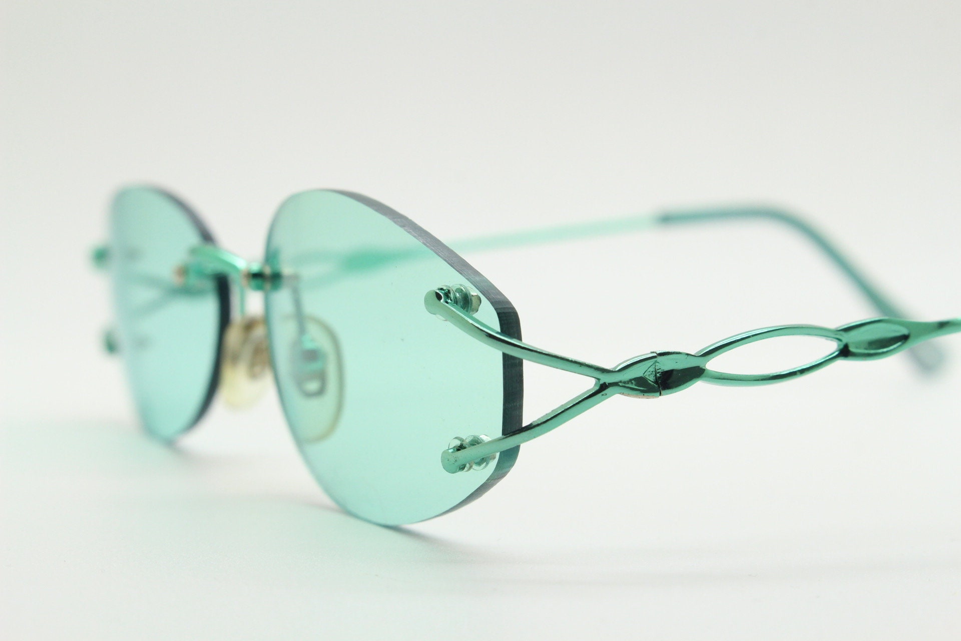Y2K Retro Oval Sunglasses Rimless Minimal Chic Hacker Style Metal Frame Celeste main image 3