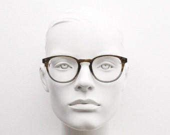 Land Rover vintage round 40s design eye glasses.Mottled brown and grey acetate optical frame with keyhole bridge. Prescription RX